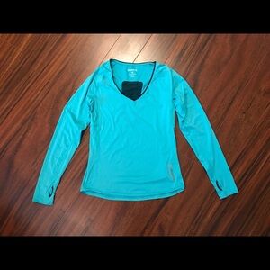 Reebok women’s medium long sleeve athletic top, teal (leans toward green)